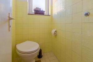 Ένα μπάνιο στο Apartman Nada