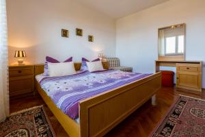 Ένα ή περισσότερα κρεβάτια σε δωμάτιο στο Apartman Nada