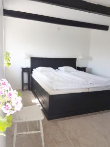 Postel nebo postele na pokoji v ubytování Gårdshotellet