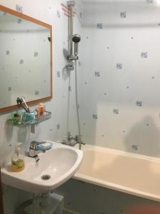 Ванная комната в Apartment Vash Dom