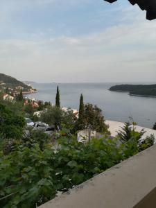 a view of a body of water from a balcony at Peric Rooms Dubrovnik in Dubrovnik