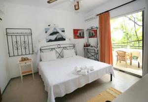Postel nebo postele na pokoji v ubytování Nakou House + 37 fotografií