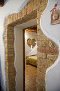 Posteľ alebo postele v izbe v ubytovaní Agriturismo Palazzo Conti A