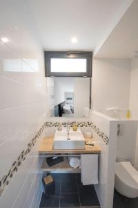 Et badeværelse på A l'Ombre des Pins