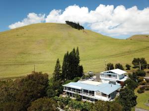 an aerial view of a house on a hill at Belle Vue Waimea B&B Corporation - Big Island of Hawaii in Waimea