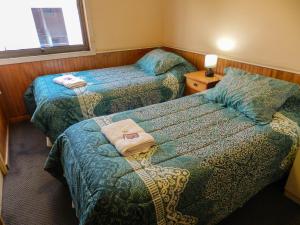 Cama o camas de una habitación en Hotel Don Matías