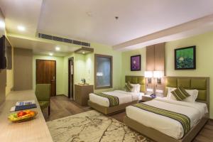 Voodi või voodid majutusasutuse Hotel Siddhartha, Nepalgunj toas