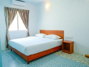 Postel nebo postele na pokoji v ubytování MG Hotel + 26 fotografií