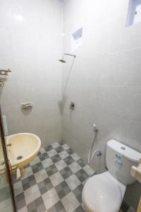 Koupelna v ubytování Hotel Lestari