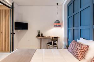 Posteľ alebo postele v izbe v ubytovaní Blue Island Luxury Apartment