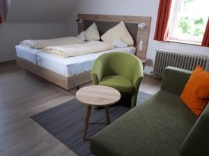 Postel nebo postele na pokoji v ubytování Gasthof zur Traube