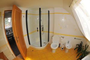 Koupelna v ubytování Apartmá u Hovorků