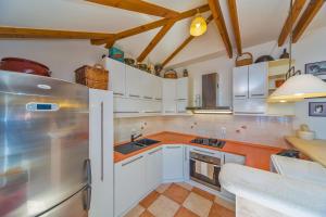 Kuchyň nebo kuchyňský kout v ubytování Apartment Varina