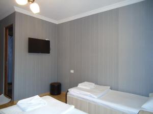 Voodi või voodid majutusasutuse Hotel Nikala toas