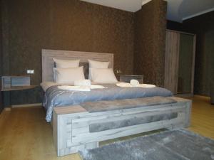 Voodi või voodid majutusasutuse Hotel Nikala toas