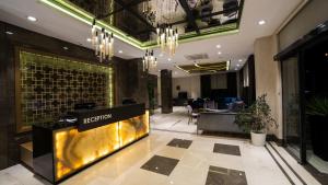 TV a/nebo společenská místnost v ubytování MD Barbaros Hotel