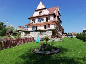 Vonkajšia záhrada v ubytovaní Apartamenty u Lolka