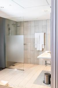 Koupelna v ubytování Trademark Hotel, a Member of Design Hotels