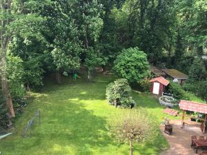 Ein Garten an der Unterkunft Leipziger Logis