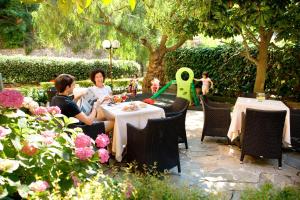 A garden outside Hotel Mediterraneo