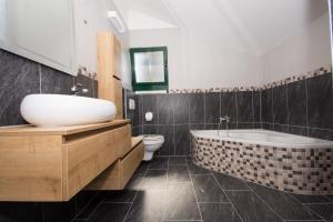 Koupelna v ubytování Guesthouse Vakans