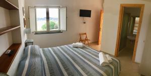 Voodi või voodid majutusasutuse Harbour View B&B toas