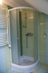 Koupelna v ubytování Mendei Vendégház Loft Apartman