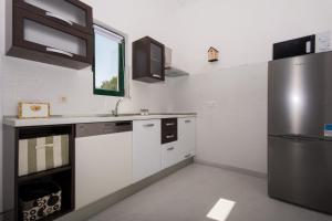 Kuchyň nebo kuchyňský kout v ubytování Guesthouse Vakans