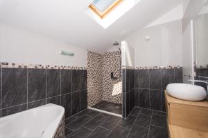 Koupelna v ubytování Guesthouse Vakans