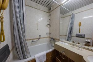 Koupelna v ubytování Hotel Medena Budget