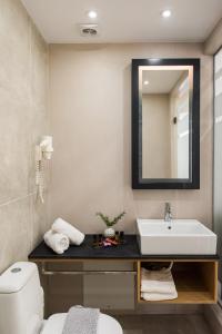 Koupelna v ubytování Harismari Cozy Hotel + 37 fotografií
