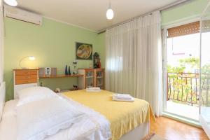 Posteľ alebo postele v izbe v ubytovaní 2B Apartment