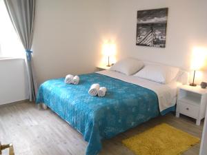 Postel nebo postele na pokoji v ubytování Apartments Barić Kučište