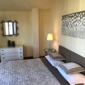 A bed or beds in a room at Claudio Appartamenti