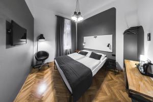 Postel nebo postele na pokoji v ubytování Czech Inn