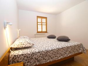 Postel nebo postele na pokoji v ubytování Apartments and rooms Novigrad 1624
