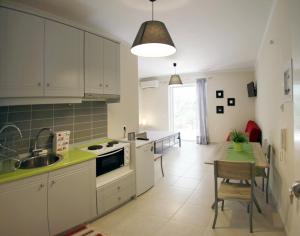 A kitchen or kitchenette at Lalezas Studios