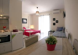 A bed or beds in a room at Lalezas Studios