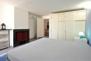Llit o llits en una habitació de Appartamento Manola