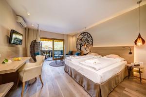 Postel nebo postele na pokoji v ubytování Hotel Wiesenhof