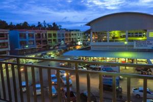 a view of a shopping center at night at Sweet Dreams Hometel in Krabi