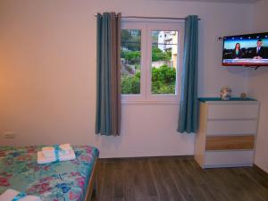 Φωτογραφία από το άλμπουμ του Room Vilma σε Komiža