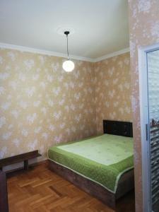 Postel nebo postele na pokoji v ubytování Guest House Quiet Home