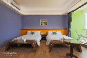 Postel nebo postele na pokoji v ubytování Pon Pon Wu Homestay