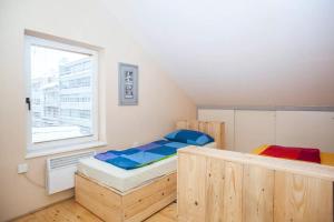 Un pat sau paturi într-o cameră la Apartment Markale