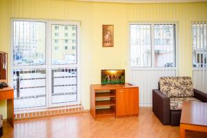 A television and/or entertainment centre at Family Hotel Varna