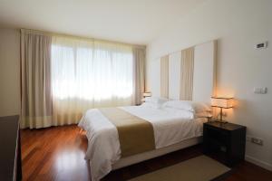 Posteľ alebo postele v izbe v ubytovaní Eden Rock Resort