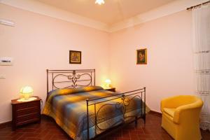 Postel nebo postele na pokoji v ubytování Agriturismo Le Carolee + 37 fotografií