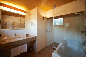 Kylpyhuone majoituspaikassa Alpenland - Das Feine Kleine