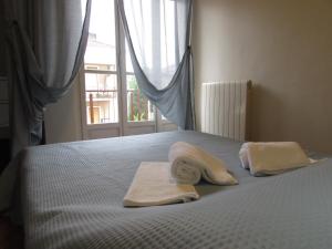 A bed or beds in a room at Sei Da Noi